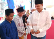 H. Ishak Melindo Tampil Beri Santunan Anak Yatim Saat Pelantikan DPC dan DPAC MADAS Serumpun Sampang