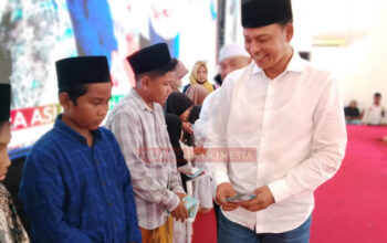 H. Ishak Melindo Tampil Beri Santunan Anak Yatim Saat Pelantikan DPC dan DPAC MADAS Serumpun Sampang